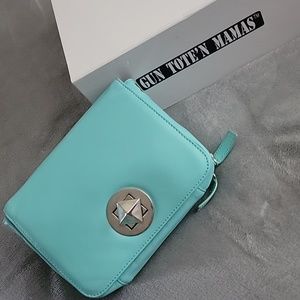 Gun tote'n mama's teal conceal carry purse. With straps. New never used.
